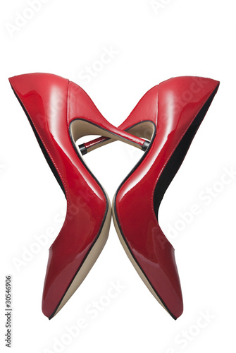 Zapatos rojos de charol formando un corazón photo