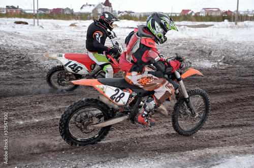 Russia, Samara March 6,2011, motocross rider two accelerated