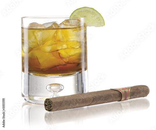 glass of whiskey with cigar