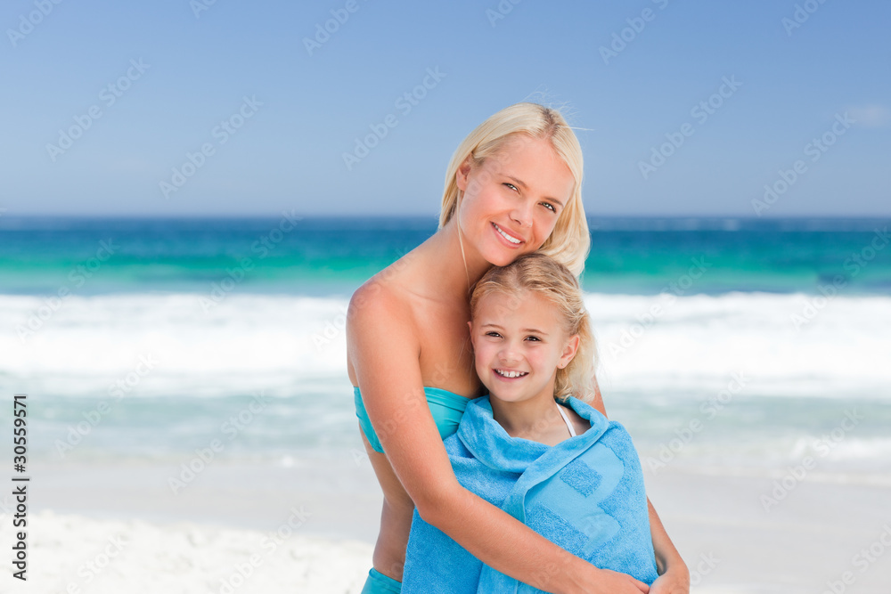 Mother with her daughter in her towel Mother with her daughter in her towel