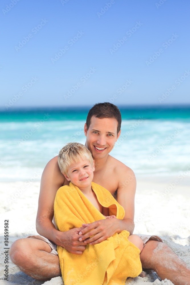 Father with his son in his towel Father with his son in his towel