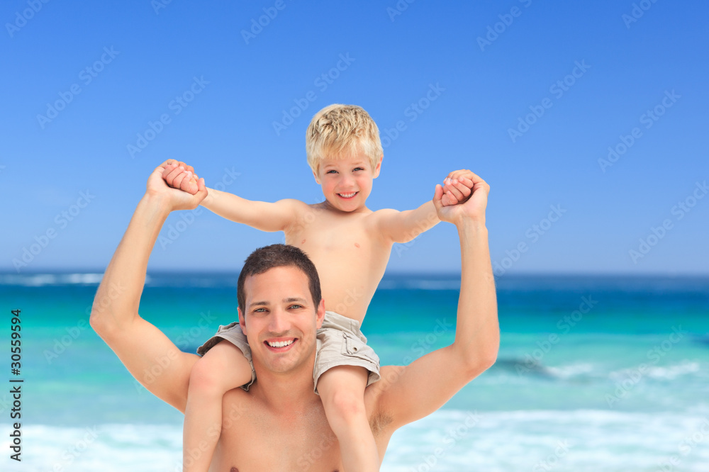 Father giving son a piggyback