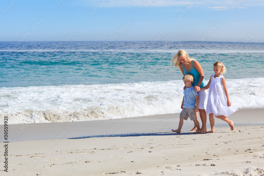 Family walking on the beach