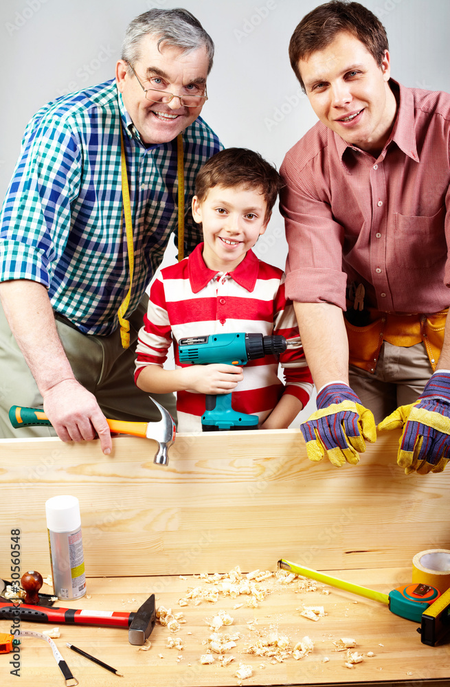 Fototapeta premium Cheerful carpenters