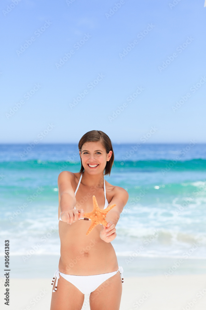 Lovely woman with a starfish