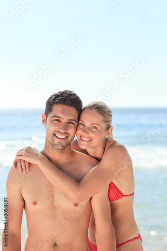 Joyful couple at the beach © WavebreakMediaMicro