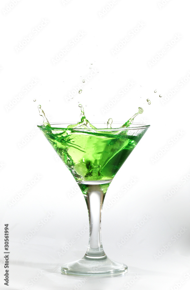 green martini cocktail splashing