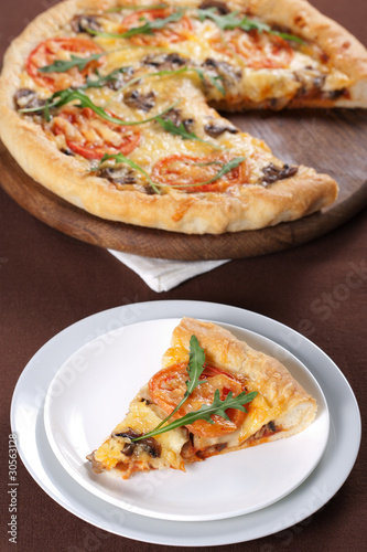 Pizza with mushroom and tomatoes