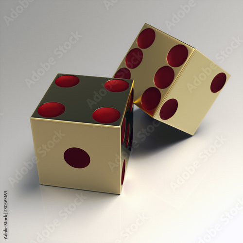 Two right handed golden casino dice with red eyes