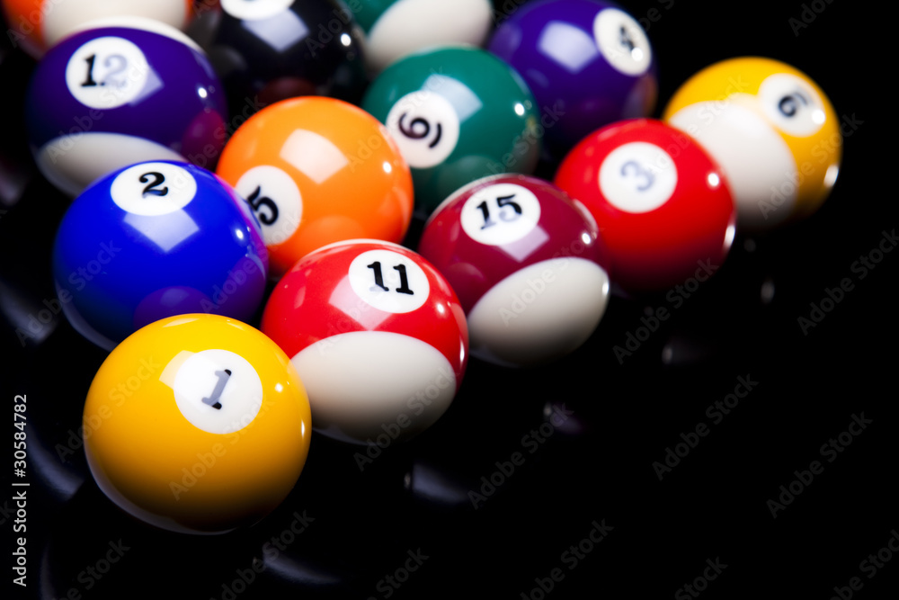 Billiard balls, cue on black table Billiard balls, cue on black table