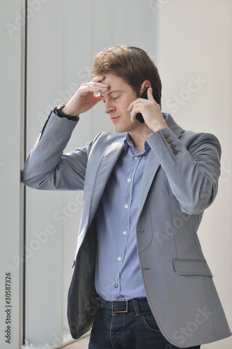 young business man talk by cellphone