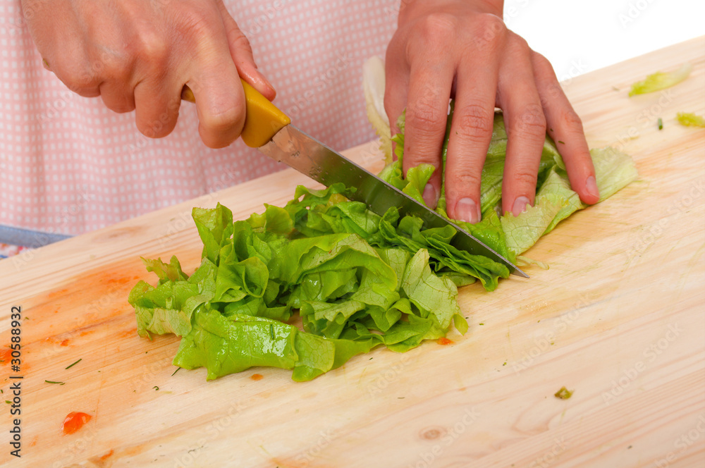 housewife preparing leaf lettuce housewife preparing leaf lettuce