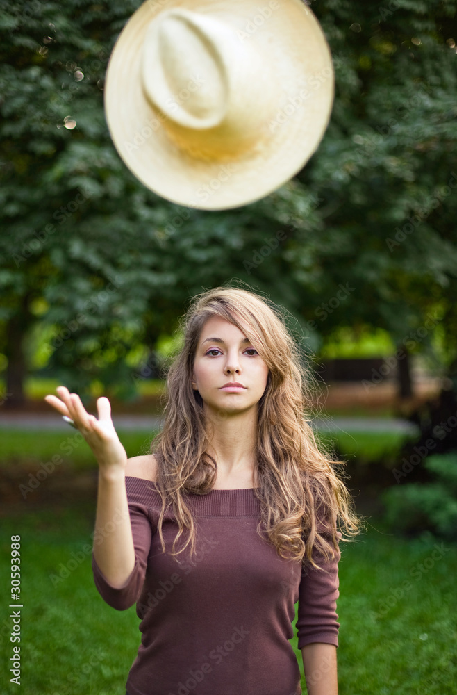 Fototapeta premium Beautilful young brunette posing outdoors.