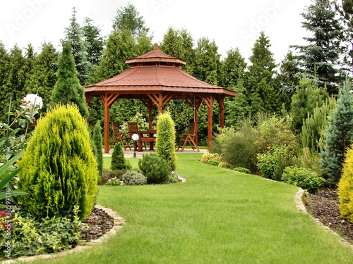 Summerhouse in the garden with chairs
