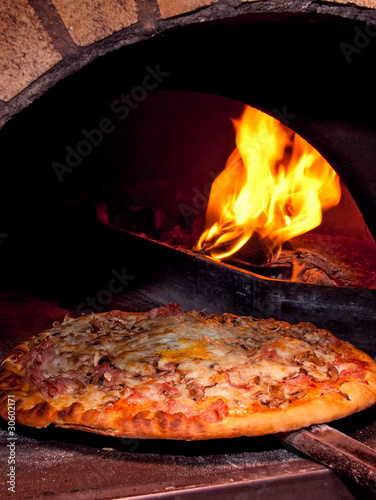 Pizza baking in the oven