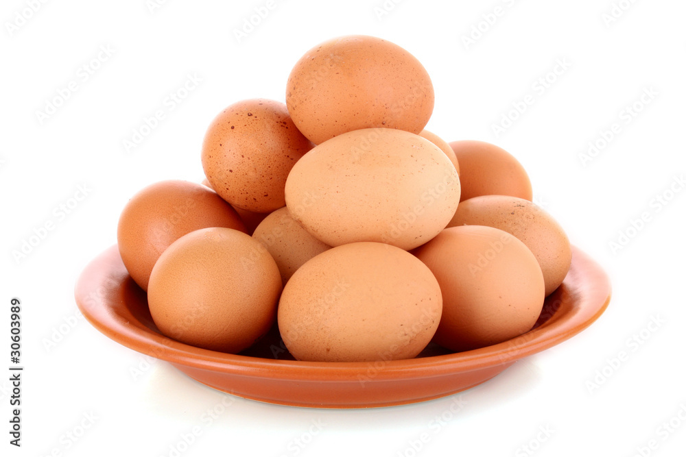 Eggs in plate isolated on white Eggs in plate isolated on white