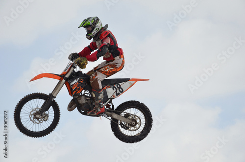 Fototapeta Naklejka Na Ścianę i Meble -  Russia, Samara, motocross rider jump, sky