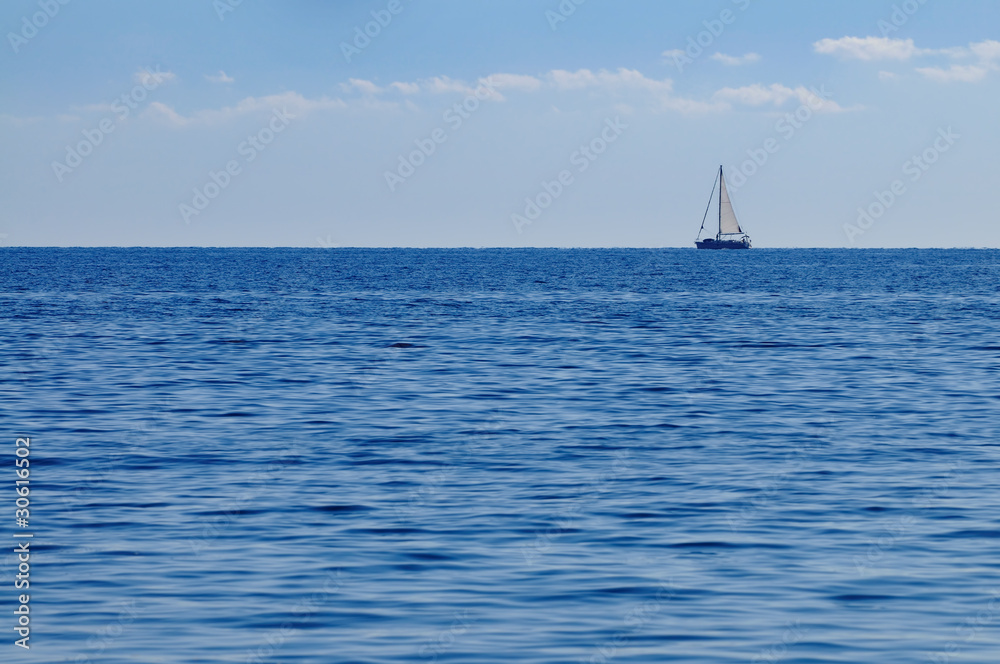 Obraz premium Sailing across water expanse