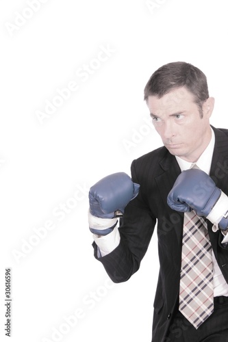 business man boxing punching bag concept image