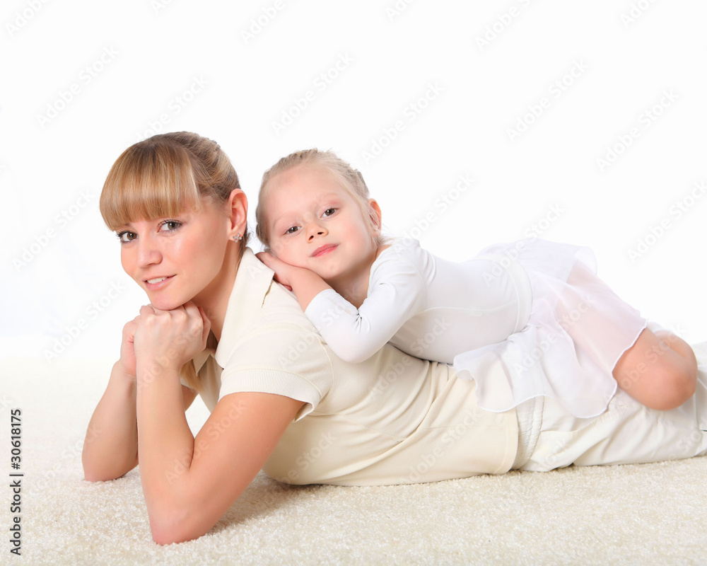 mother and little daughter doing sport together mother and little daughter doing sport together