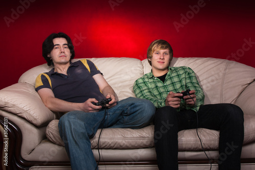 two friends playing video games