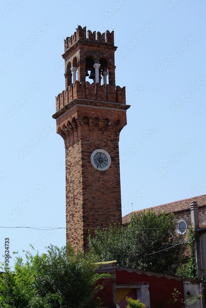 The campanile of Murano in the lagoon of Venice in Italy