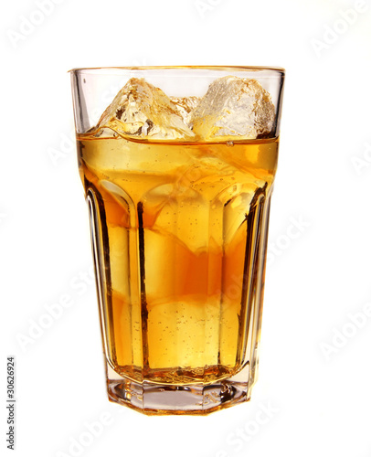 Glass of alcoholic drink with ice cubes