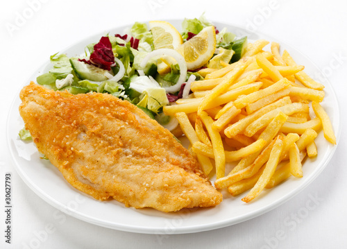 Photography Fish dish - fried fish fillet, French fries  with vegetables