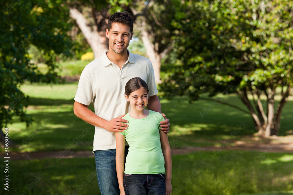 Daughter with her father in the park Daughter with her father in the park