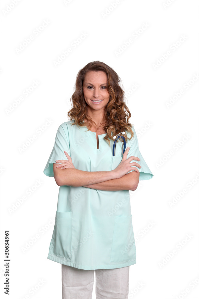 Smiling nurse on white background with arms crossed Smiling nurse on white background with arms crossed