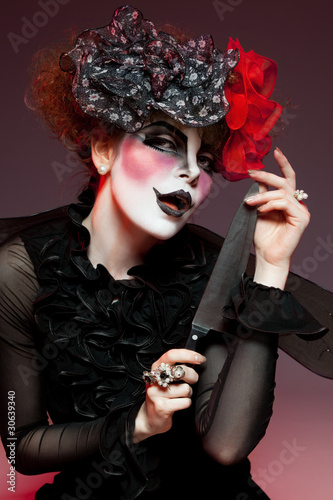 woman mime with knife photo