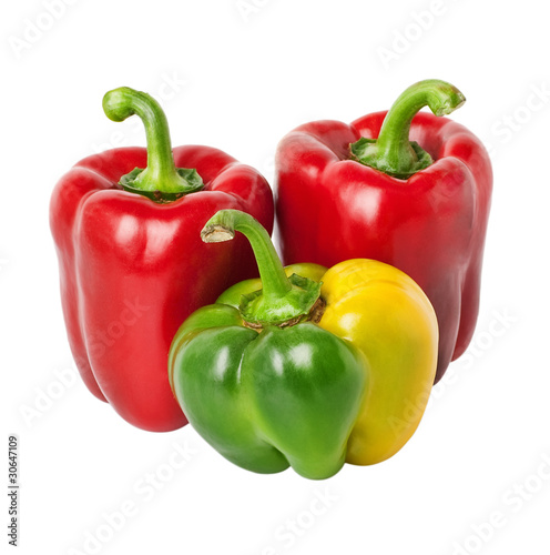 three peppers on a white background.