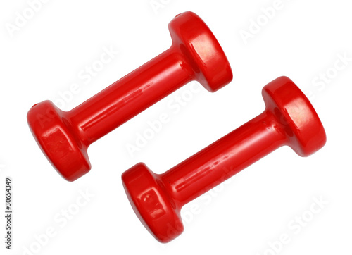 Two red dumbbells isolated over white background
