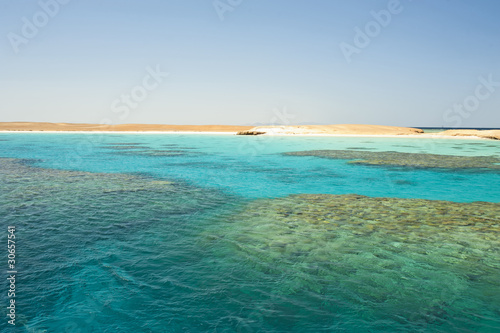 Fototapeta Naklejka Na Ścianę i Meble -  Tropical reef next to an island