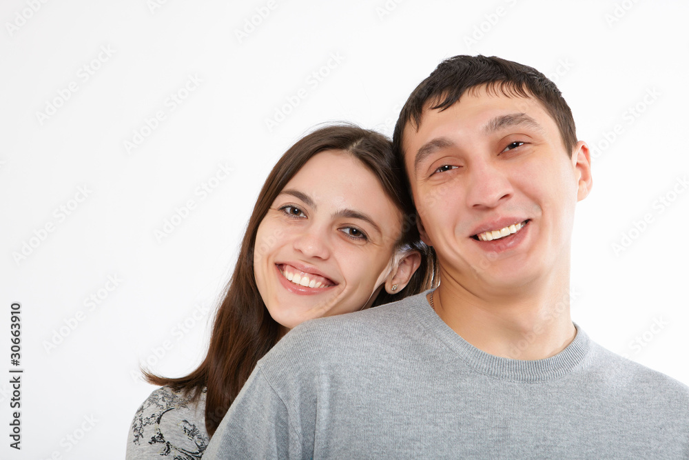 a happy young couple in love a happy young couple in love