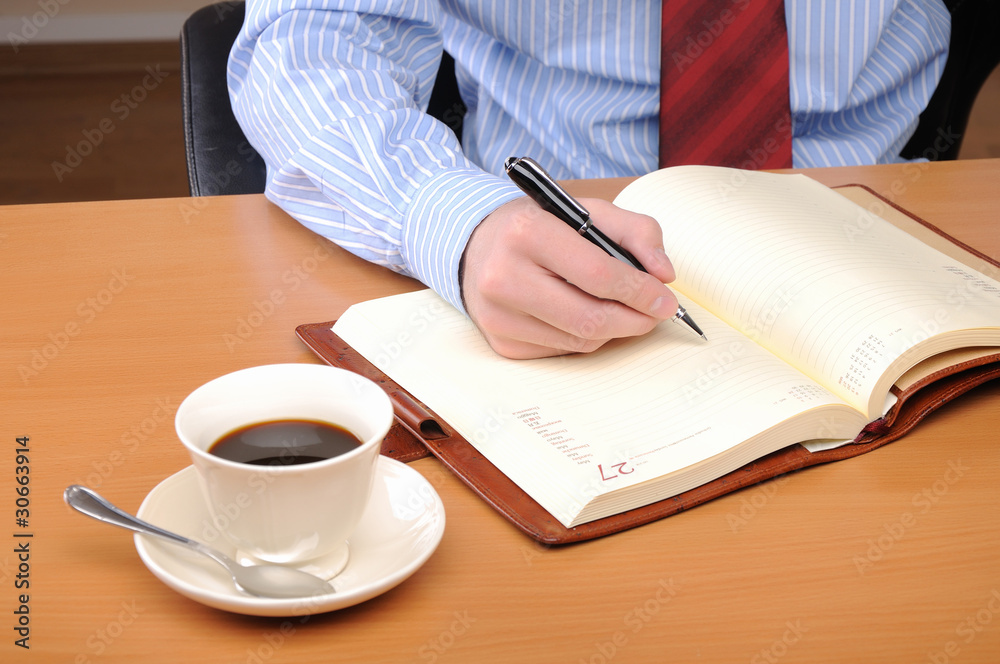 young business man working in an office young business man working in an office