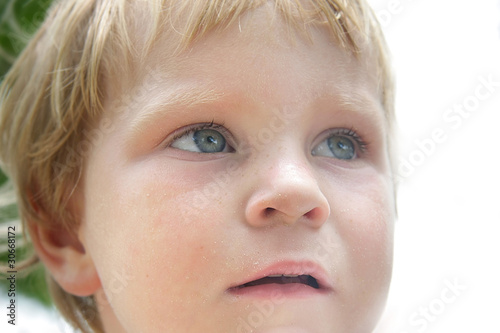 close up child portrait on natural background