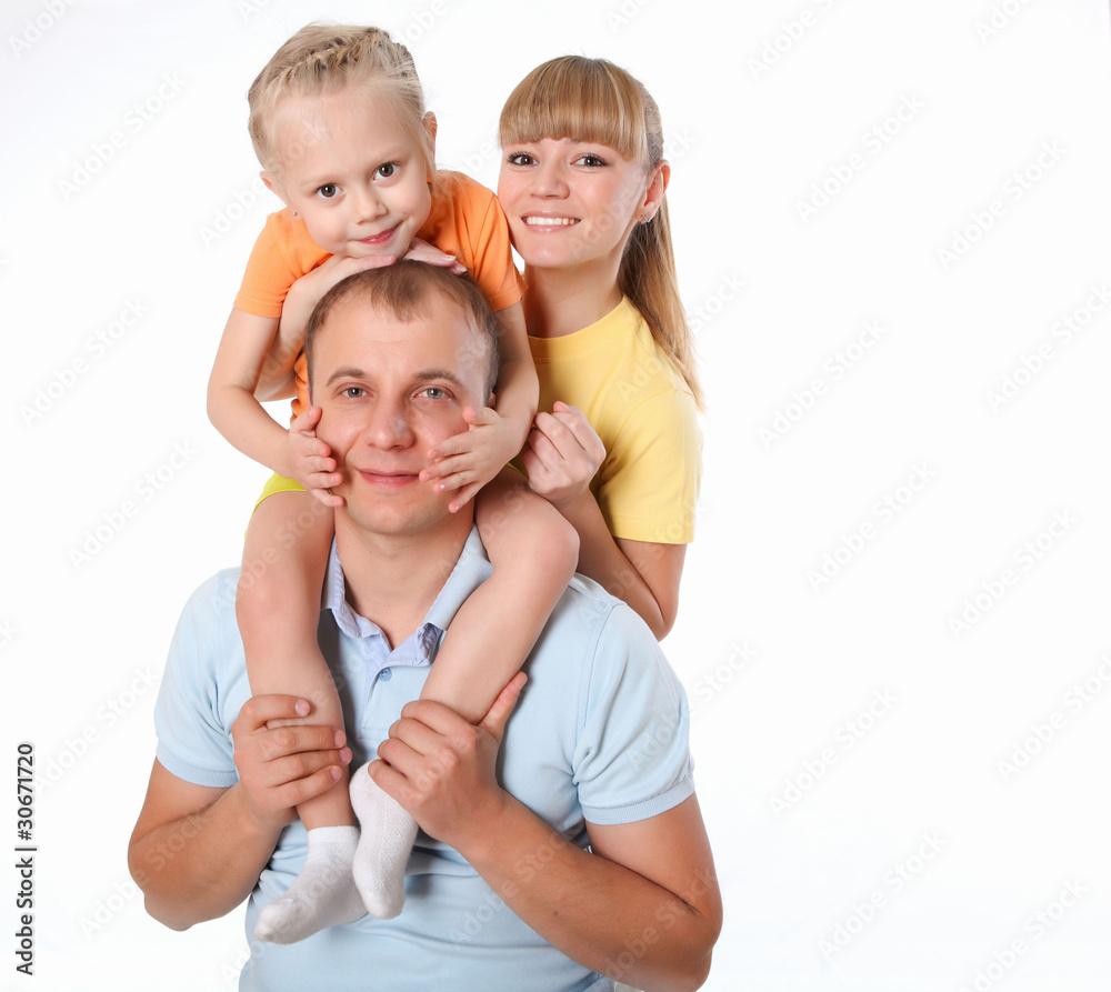 family with a little daughter doing sport together family with a little daughter doing sport together