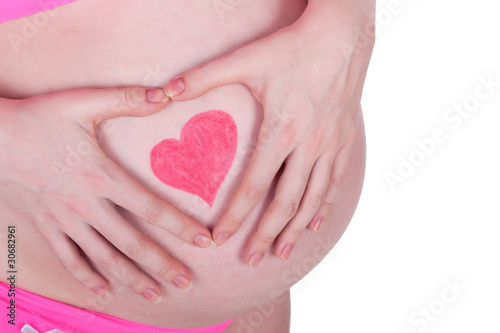 Wallpaper Mural caucasian pregnant woman with heart drawn on the belly isolated Torontodigital.ca