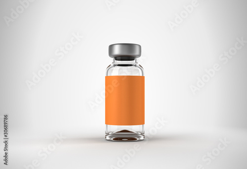 Single medical ampoule over grey
