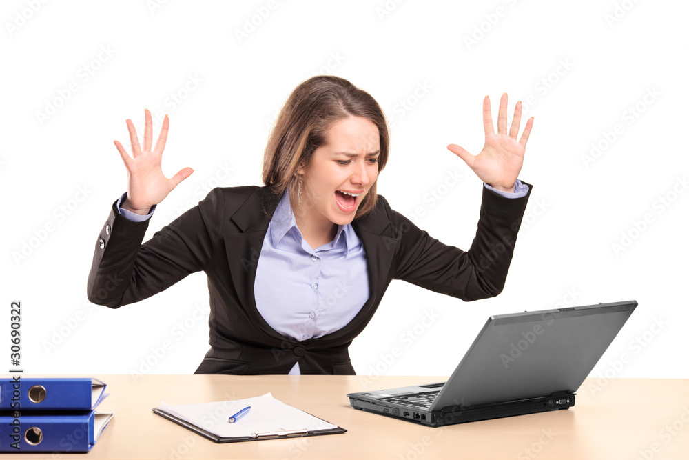 A nervous young businesswoman yelling isolated on white A nervous young businesswoman yelling isolated on white