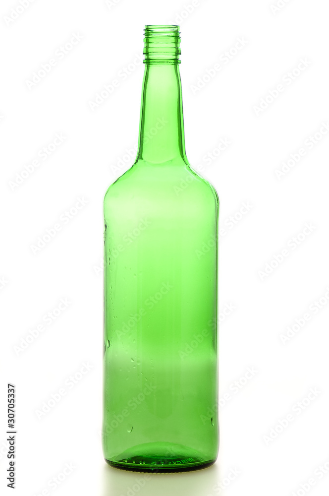 Whiskey bottle against white Whiskey bottle against white