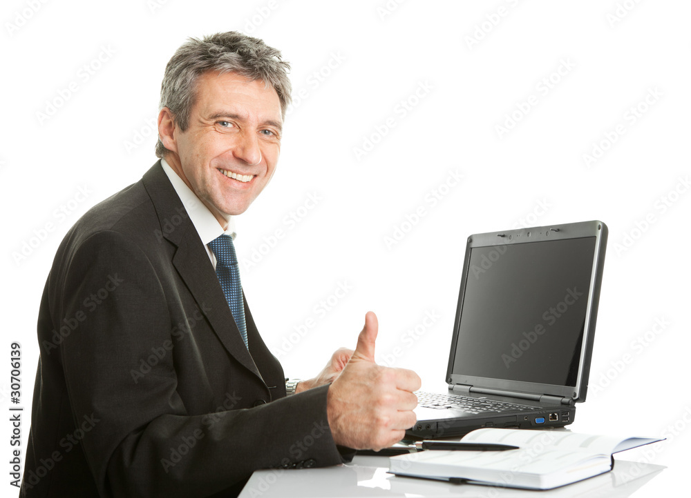 Senior business man working on laptop Senior business man working on laptop
