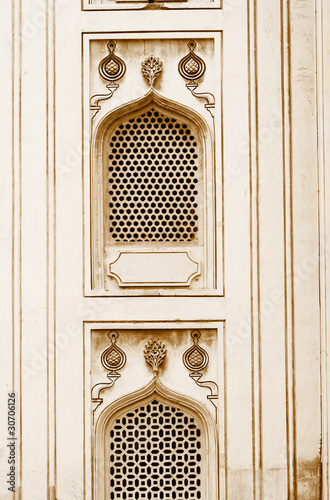 Nijam style windows on historic 400 year old charminar in India photo