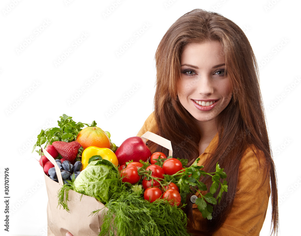 woman holding a bag full of healthy food. shopping . woman holding a bag full of healthy food. shopping .