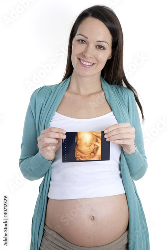 Pregnant woman holding 4D scan