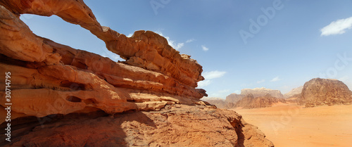 rock bridge and panoramic view of Wadi Rum desert  Jordan