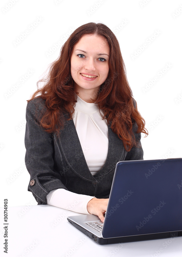 Young smiling business woman working with laptop Young smiling business woman working with laptop
