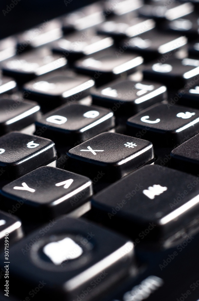 Black buttons of a keyboard from a computer Black buttons of a keyboard from a computer
