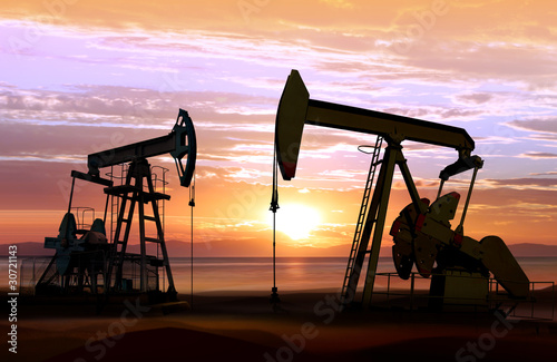 oil pumps on sunset photo